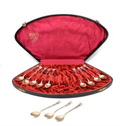 Set of twelve early 20th century Danish silver coffee spoons, with embossed decoration to ...