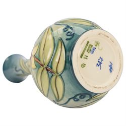 Moorcroft vase in Carousel Jasmine pattern, of baluster form with elongated neck, with printed mark beneath, in original box, H23cm