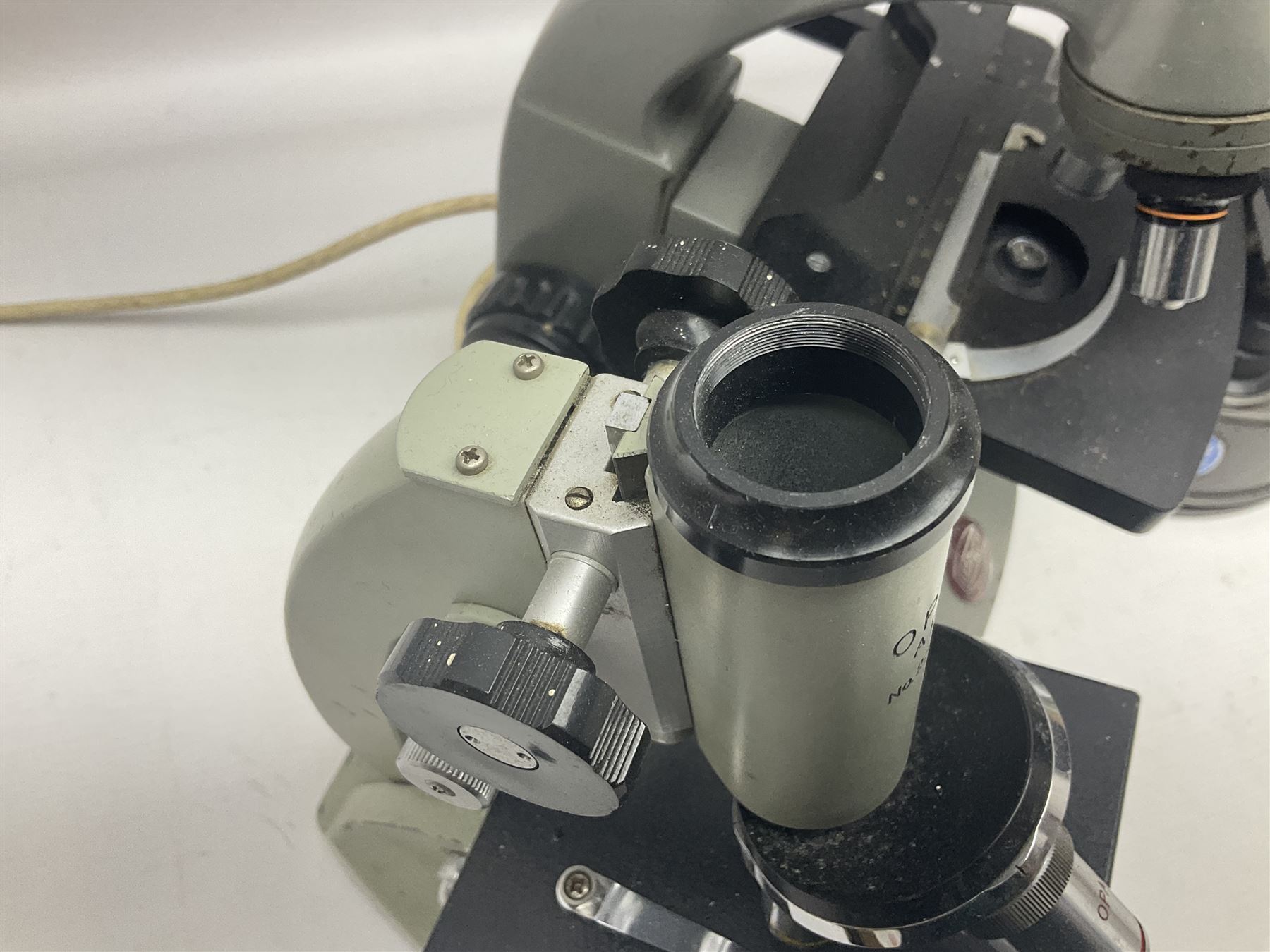 Four microscopes, comprising C Baker London Vickers, Back Diamax no 40956, Opax ABF no 232733 and one other 
