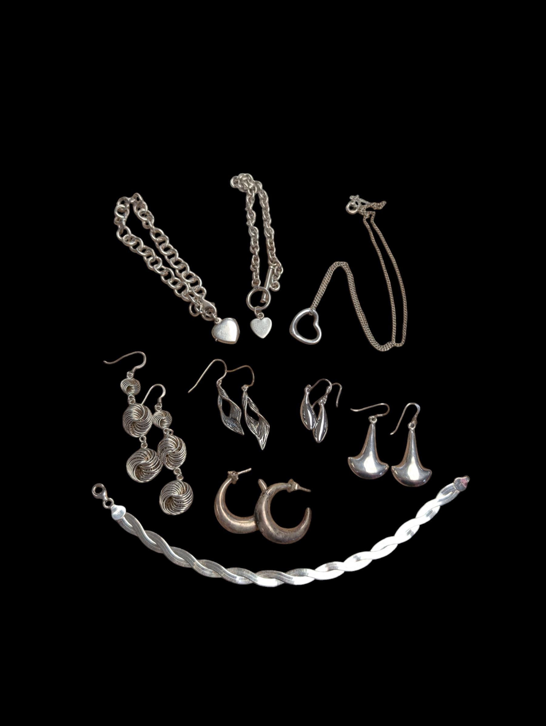 Collection of silver jewellery, including earrings, bracelets, necklaces etc