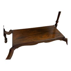 Late Victorian walnut writing table, rectangular leather-inset top surmounted by a brass gallery, fitted with a single frieze drawer, raised on turned tapering supports with lower undertier and ceramic castors