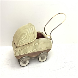 1950s Martin Holtappels plastic woven basketwork doll's pram with floral padded lining, retractable canopy, curving tubular handle, white metal wheel arches and solid rubber tyres L82cm H70cm