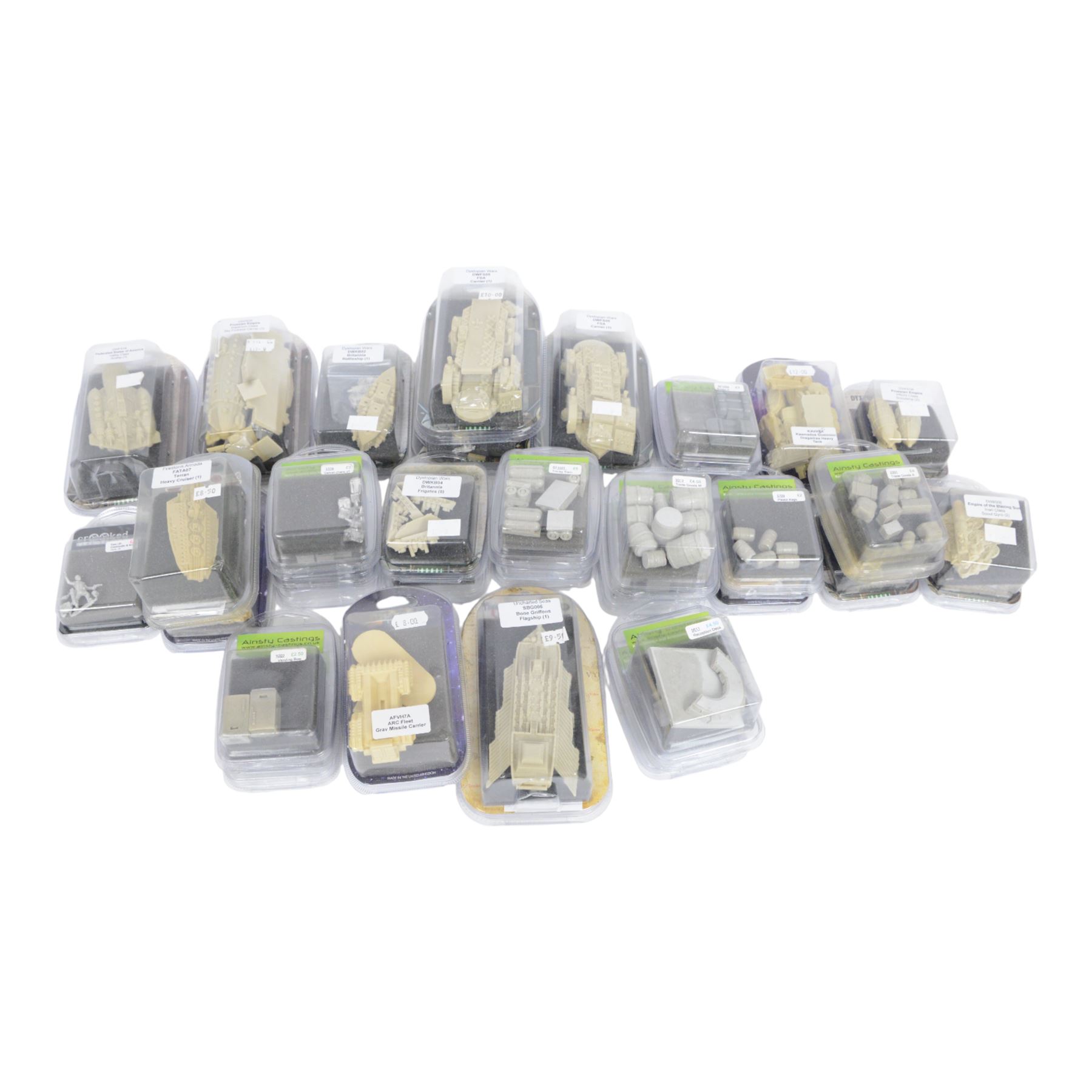 Collection of sci-fi gaming miniatures, including vehicles, space ships and trade goods, from Dystopian Wars, Ainsty Casting, Critical Mass and Firestorm Armada, all within blister packaging 