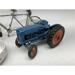 Chad Valley clockwork Fordson Major Tractor, a group of play worn Britains and other lead and metal farm animals, figures and accessories including a kennel, haystacks, dovecote, cows, sheep etc, together with a diecast model of a Tandem Bike L31cm