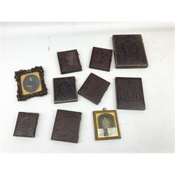 Collection of ten assorted Victorian daguerreotype, ambrotype and tintype portraits, most contained within leather cases with embossed red velvet or red silk lining, largest example with scrolling foliate embossed exterior H15cm when closed W12cm