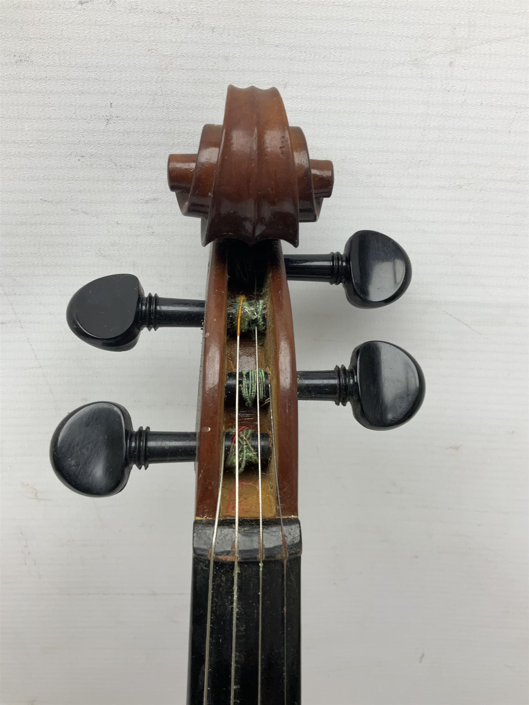 Chinese Parrot violin with 35.5cm two-piece back; L59.5cm in carrying case; and early 20th century German violin for restoration; bears label 'Antonius Stradivarius Faciebat Anno 1730'; cased with bow (2)