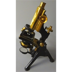  Early 20th century black japanned & lacquered brass monocular 'Edinburgh' Microscope, stamped W.Watson & Sons High Holborn, No.26613, with rack & pinion coarse and fine adjust, three objective turret on three outsplayed feet, in fitted mahogany case with additional objective, filters etc   