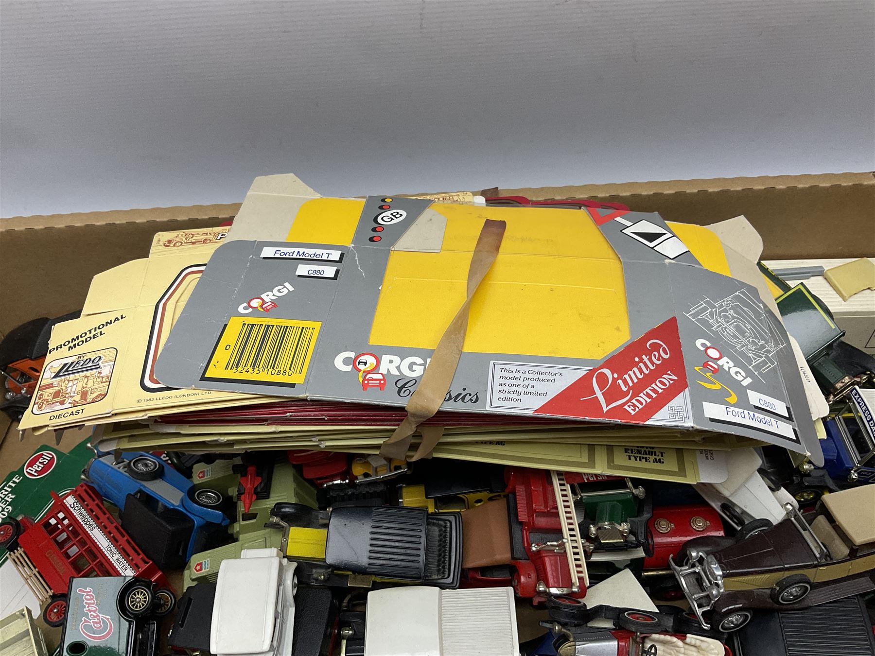 Over fifty modern die-cast models, predominantly Matchbox, including cars, promotional  and commercial vehicles; and a quantity of flat-packed model boxes