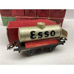Hornby '0' gauge - twelve goods wagons including lumber wagon, tank wagon, cattle truck, cement wagon, goods brake van, flat truck etc; all boxed but three in associated boxes; together with No.1 Crane Truck and No.1 Water Tower; both boxed (14)