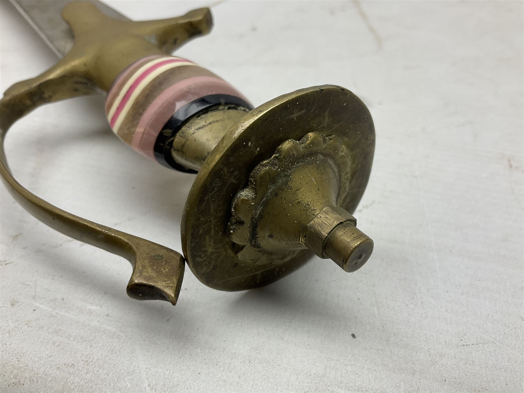 Early 20th century Indian ebonised sword stick, the 59.5cm blade with punched decoration and horn grip L94cm overall; and a reproduction Indian tulwar with scabbard (2)