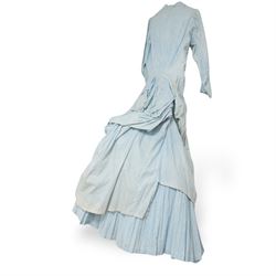 Victorian ladies button-down bodice and skirt, in blue and white striped fabric with pleated detailing, the skirt with gathered bustle back