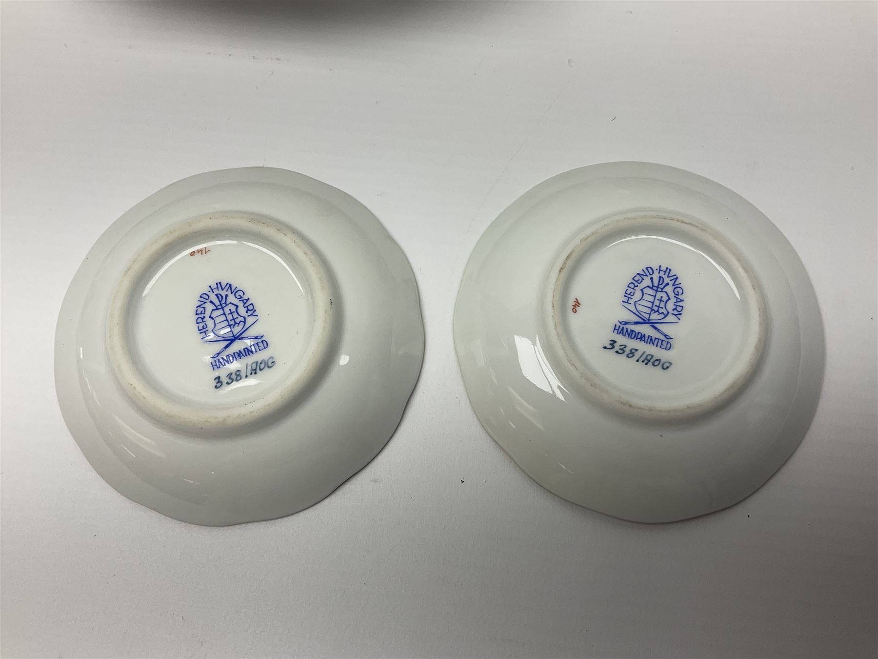 Herend Chinese Bouquet Rose pattern tea service comprising teapot, coffee pot, open sucrier, six cups and saucers, six tea plates, cream jug and stand, milk jug, two teabag holders, preserve pot, two leaf shaped dishes, four egg cups, salt & pepper pots, pair side plates and another plate