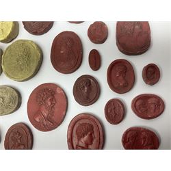 Large and impressive collection of Grand Tour cameos and intaglios (impronte), mostly red plaster examples