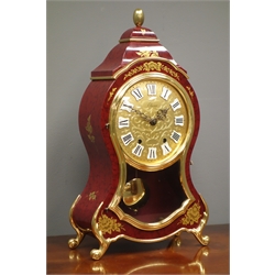  'Eluxa' French style mantel clock, cartouche shaped red lacquered and gilt decorated case, twin train movement striking the hours and half on bell, H37cm  