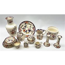 A group of Masons Ironstone Mandalay pattern wares, comprising large vase, planter with twin lug handles, three graduated plates, bowl, teapot, teacup and saucer, jug, smaller jug, open sucrier, small pot and cover, pair of candlesticks, small mantel clock, and pin dish. 