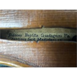 French violin c1900 labelled Guadagnini with 35.5cm two-piece maple back and ribs and spruce top, labelled 'Joannes Baptista Guadagnini Pla Centinus Fecit Mediolani 17**' L59cm overall; in hard carrying case