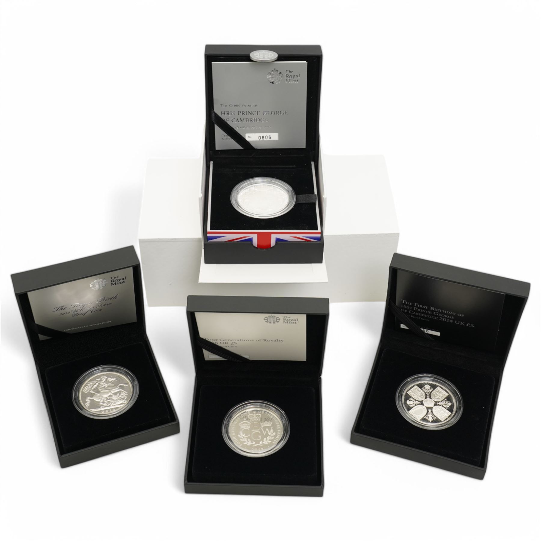 Four The Royal Mint United Kingdom silver proof five pound coins, comprising 2013 'The Christening Of HRH Prince George Of Cambridge', 2013 'The Royal Birth', 2014 'The First Birthday Of HRH Prince George Of Cambridge' and 2018 'Four Generations of Royalty', all cased with certificates