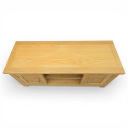 Contemporary oak television media cabinet, rectangular top fitted with two cupboards and central open shelf