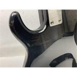 Encore black electric cut-away guitar L96cm; and Spanish Victor Garcia model 187 acoustic guitar, bears label dated 1972 L99cm; each in soft carrying case (2)