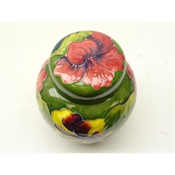  Moorcroft Hibiscus pattern ginger jar and cover on green ground, H16cm   
