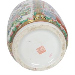 Pair of Japaneses imari vases, the central panel, decorated with figures in a landscape, together with famille rose vase, largest H37cm  