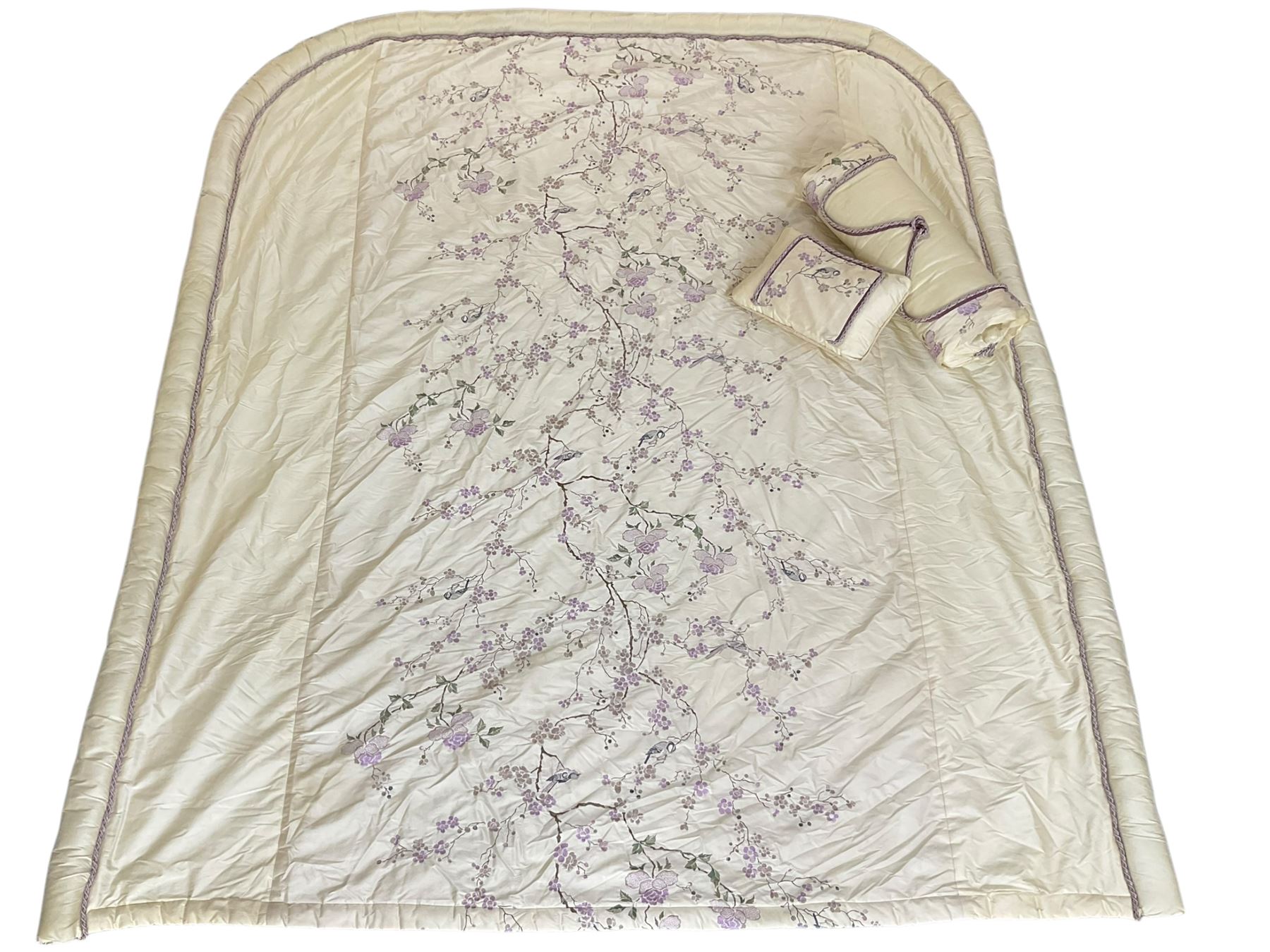 5' Kingsize headboard with stepped arch cresting, upholstered in cream silk with raised stitching decorated with trailing foliage branches and birds; matching bedspread (251cm x 218cm); two matching cushions  