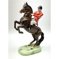 A Beswick model of a huntsman on rearing