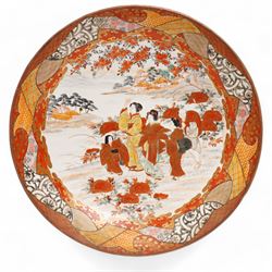 Japanese Meiji Kutani shallow bowl decorated with birds with fan shape and circular panels in orange and gilt, character mark to base D30cm and another Japanese bowl decorated with a centre panel of figures in orange, gilt etc D30cm (2)