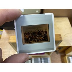 Large collection of slides of militaria interest to include examples of military uniforms and soldiers etc, housed in cases 