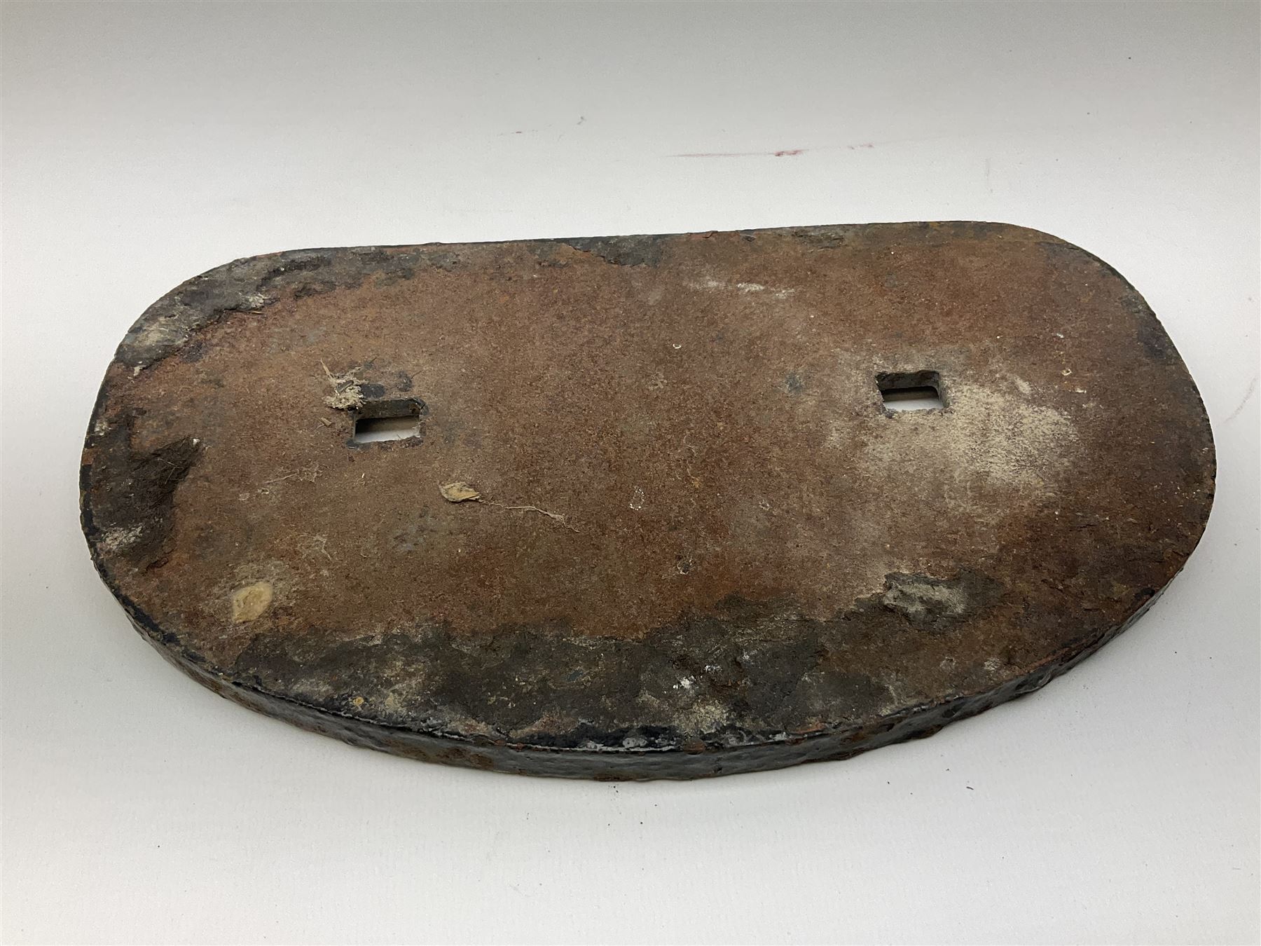 Three cast iron railway wagon plates of D shaped form to include Southern Railway, LMS and GWR, L27.5cm