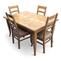 Barker and Stonehouse Flag Stone extending dining table and four matching chairs, the rectangular top with parquetry inlay and contrasting border, extending by central leaf, on slightly curved supports, the chairs with padded upholstered seats and ladder backs (Chairs H 108cm, W 50cm, D 54cm) (Extends to 195cm)