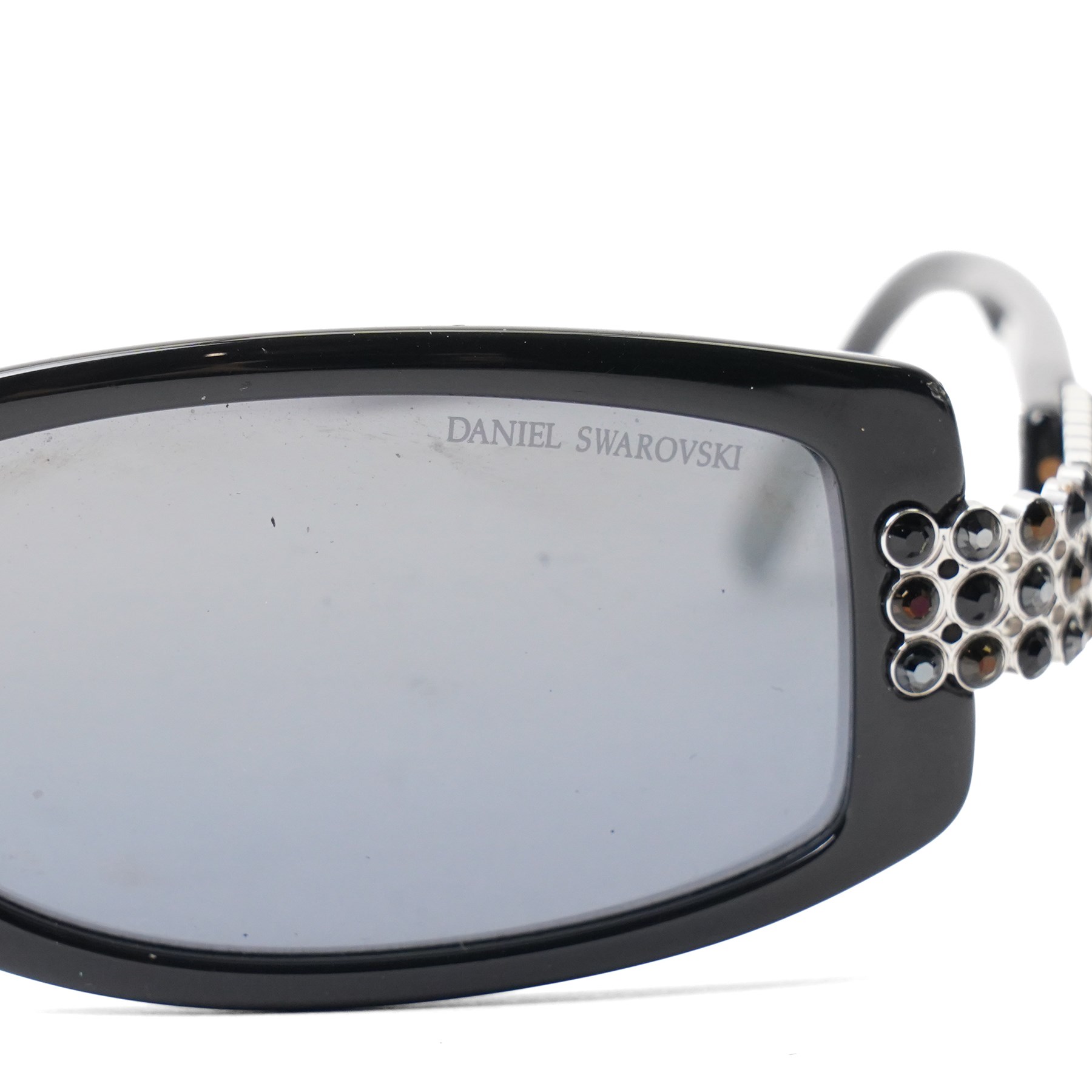 Daniel Swarovski - black acetate sunglasses with dark tinted lenses and crystal-set silver-tone panels to the temples, signed to the arm interior