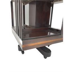 20th century mahogany revolving bookcase, inlaid centre motif, satinwood banded border