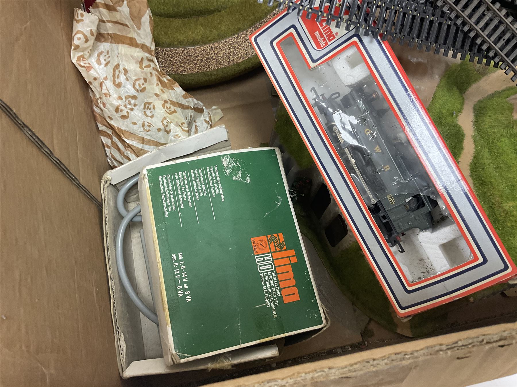 Large quantity of toy railway collectables, to include Faller ‘Hit Train’ boxed sets 3706, 3732, 3753; Lima automatic car unloader, quantity of track and accessories, etc in two boxes 