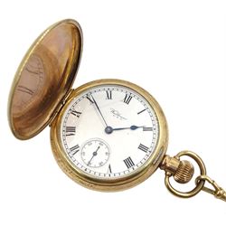 Gold-plated full hunter keyless Traveller pocket watch by Waltham U.S.A, No. 27132975, white enamel dial with Roman numerals and subsidiary seconds dial, with gold-plated Albert chain