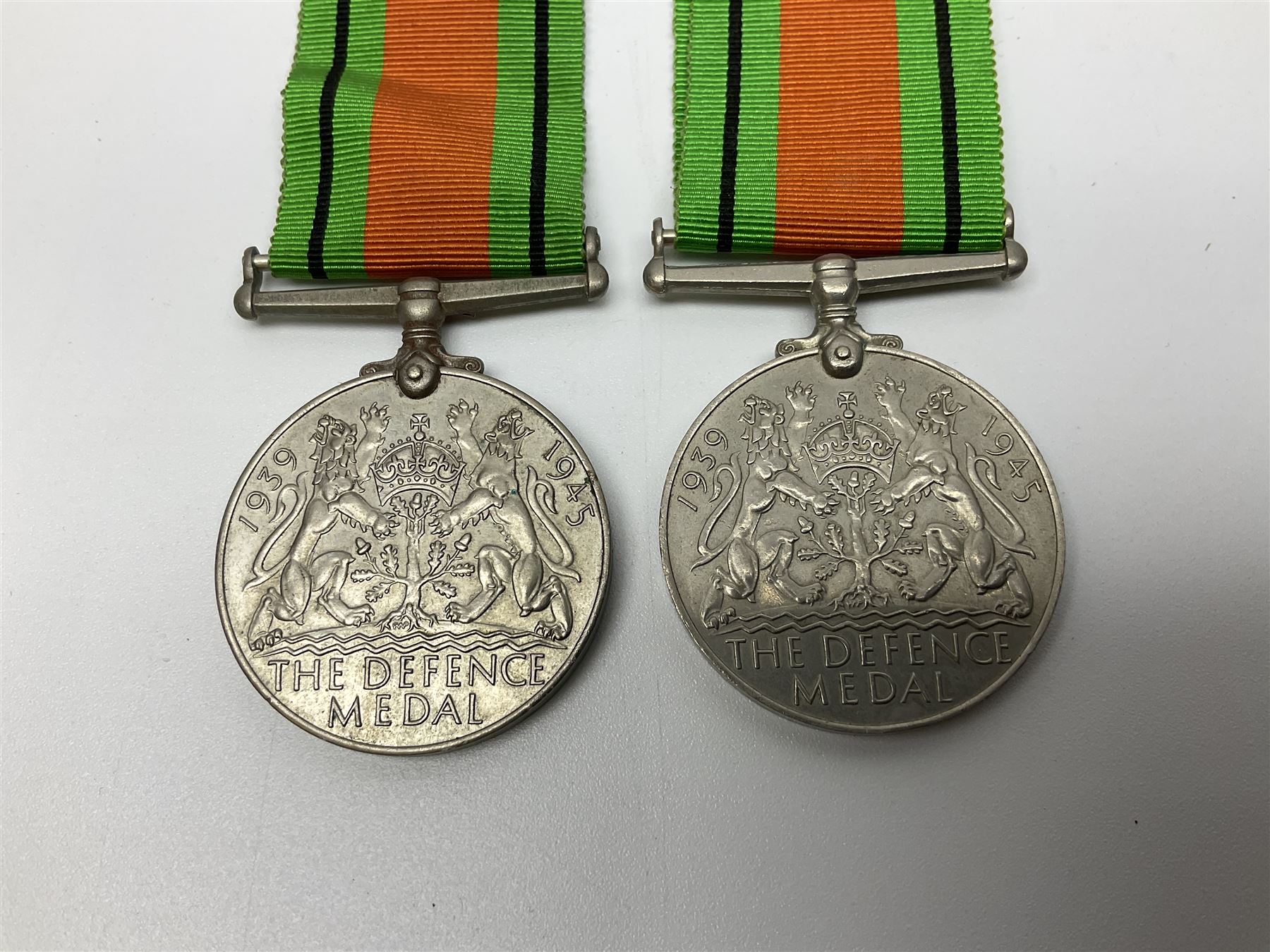Eleven WW2 medals comprising three 1939-1945 war medals, two Defence medals, three 1939-1945 Stars, Atlantic Star, Africa Star and Italy Star; miniature QEII Naval LS & GC medal; all with ribbons; and WW2 postumous medal slip to Flight Sergeant L.N. Clark