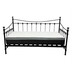 Contemporary Victorian revival black metal day bed, featuring arched back and sides with turned finials and spindle rails, complete with single 'OTTO' mattress