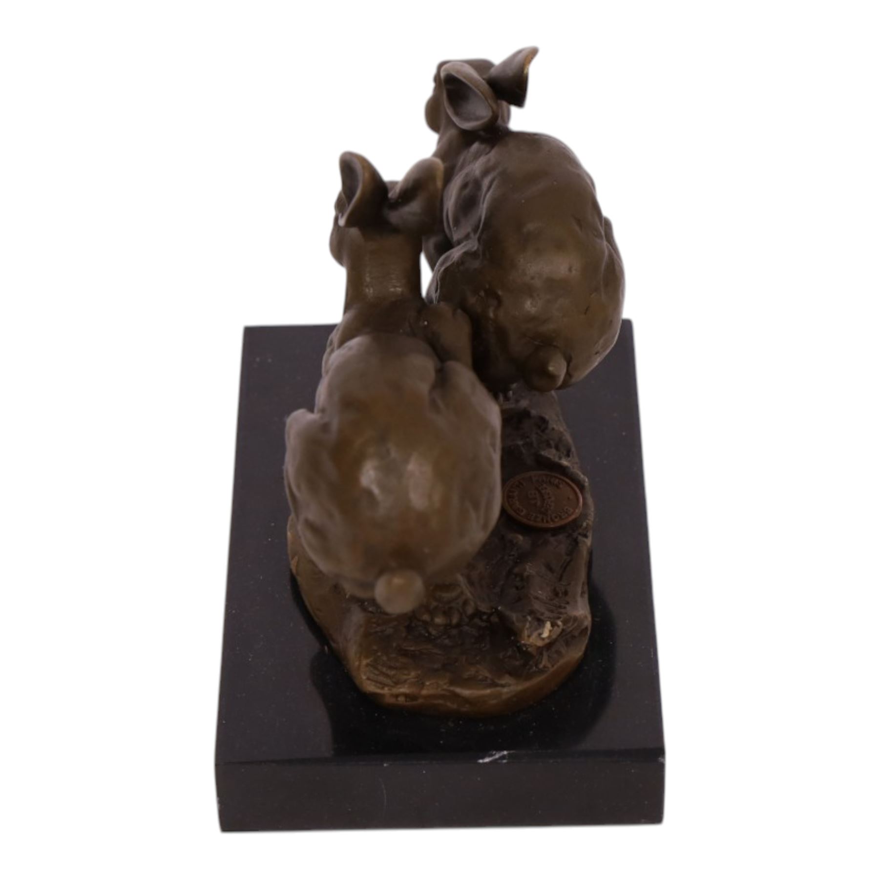 Bronze figure group, modelled two hares in chase, upon naturalistically modelled oval base signed Nick and with foundry mark, raised upon black marble base, H11cm L12.5cm