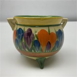 Clarice Cliff Bizarre for Newport Pottery, small bowl in the form of cauldron painted in the Crocus pattern, bordered by brown and yellow banding, with angular handles and raised upon three peg feet, with green printed mark and painted CROCUS beneath, circa 1929, H7cm