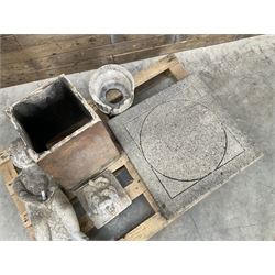 Collection of three Victorian and early 20th century reclaimed terracotta chimney pots, comprising: one cylindrical form with weathered, cracked glaze and flared octagonal base; one deep red cylindrical pot with fluted midsection and castellated rim, bearing moulded number ‘25’; and one tapering hexagonal example with wide flared rim and weathered patina. All with age-related wear and chips, consistent with use and outdoor exposure. Plus a selection of cast stone pieces including fountain 