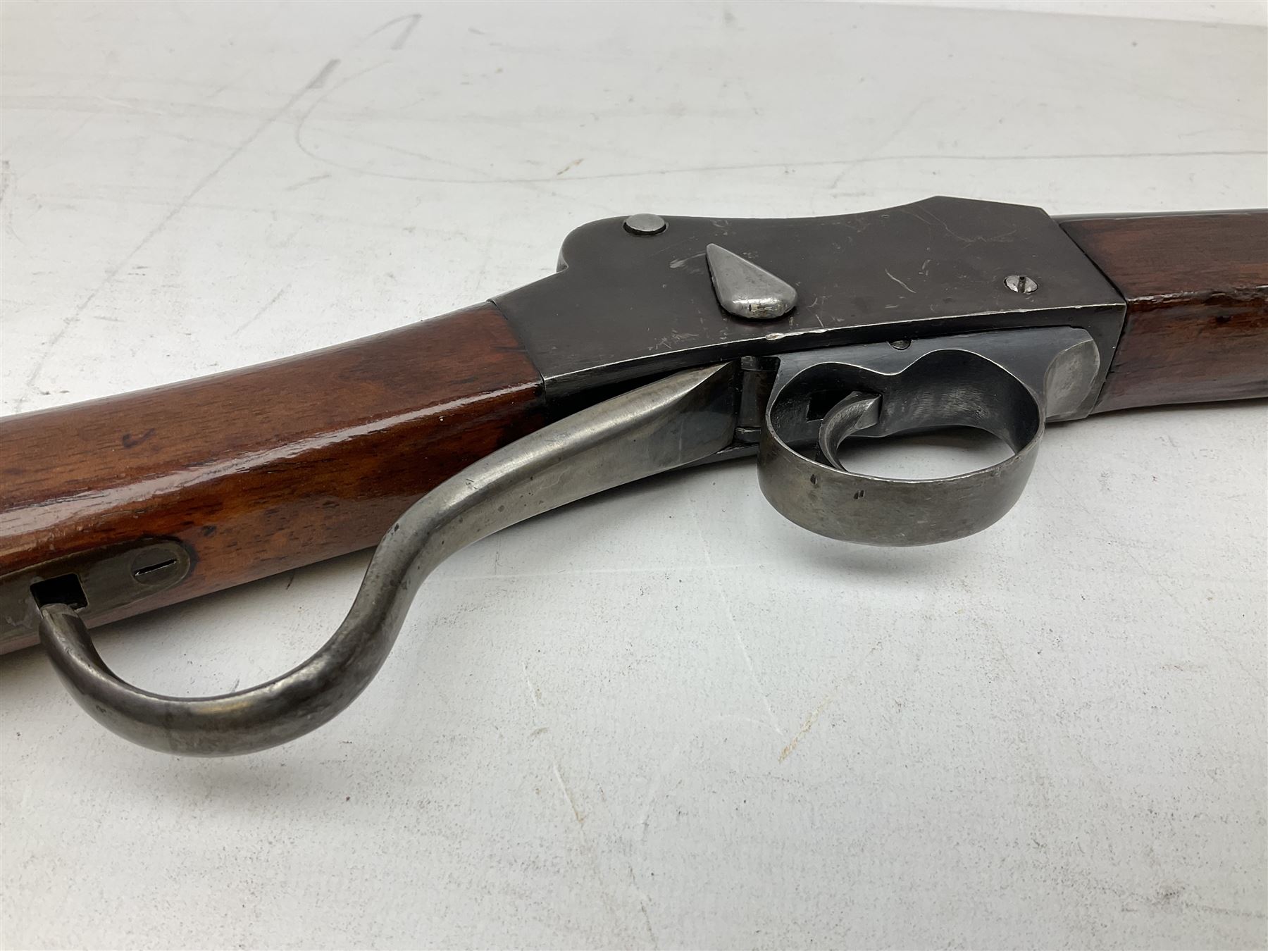 Westley Richards .310 Cadet Martini action rifle, the 63.5cm smooth bored barrel with one barrel band, walnut stock stamped 93/352 with hinged compartment to butt, serial no.3365, L103cm