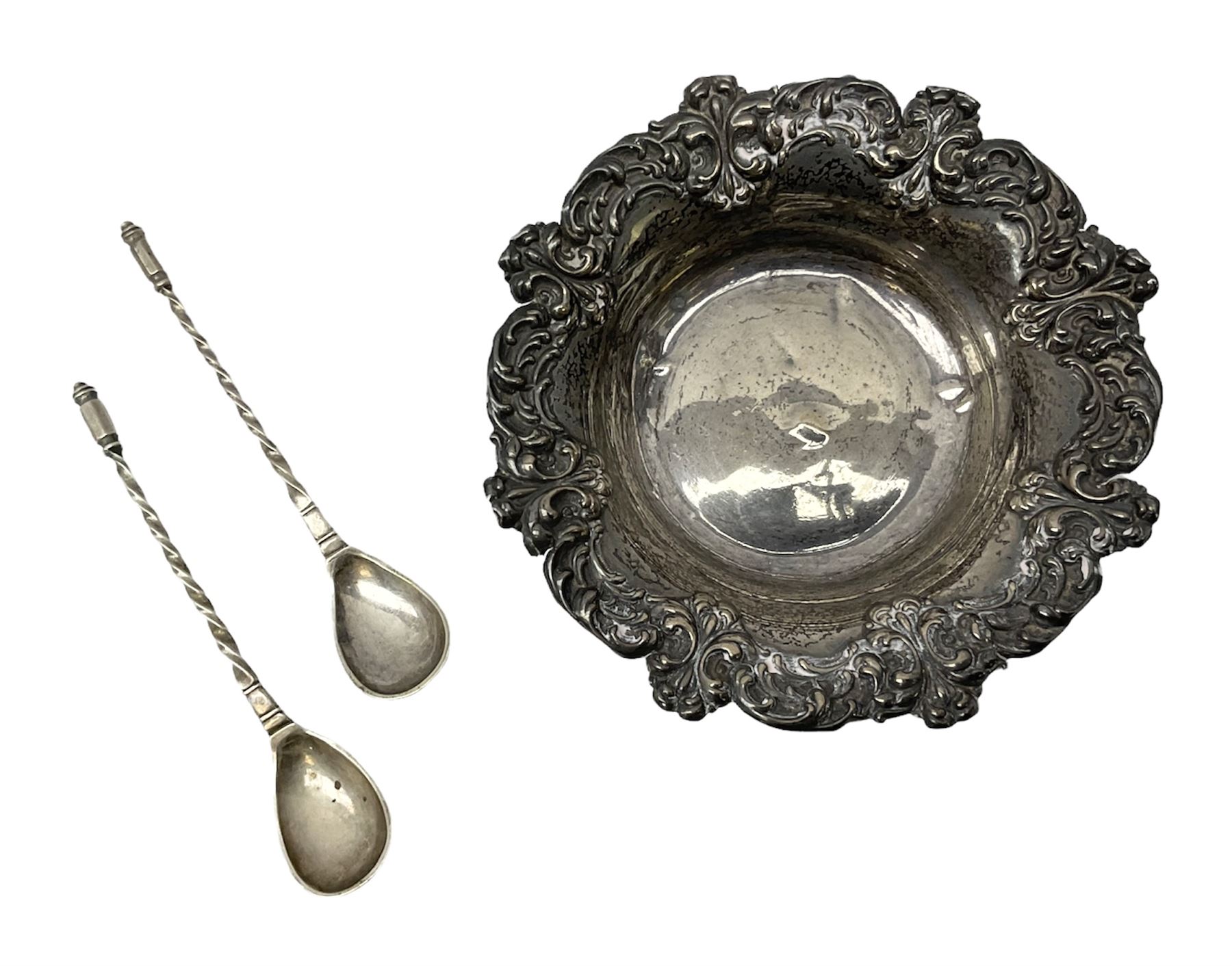 Small silver dish with repousse scrolling edge, stamped Sterling, together with a pair of Danish silver spoons, approximate total weight 61.4 grams