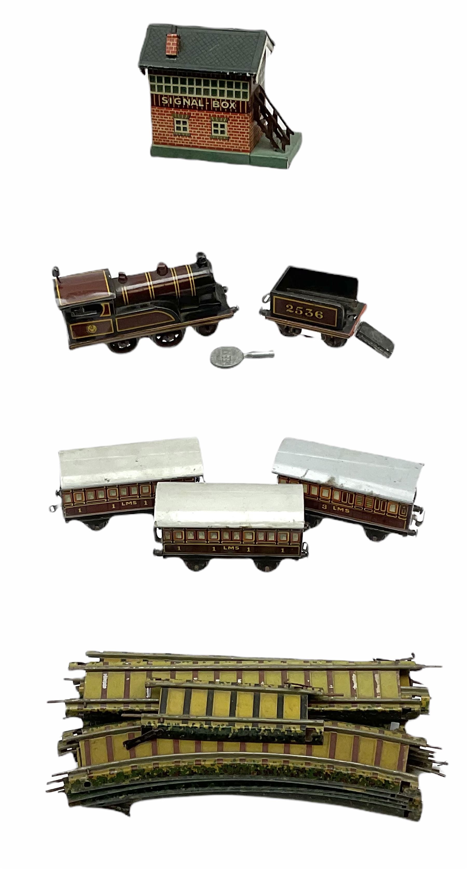 Bing '00' gauge - Table Top train set with clockwork 2-4-0 LMS locomotive and tender, three passenger coaches, signal box and thirteen sections of track; unboxed.