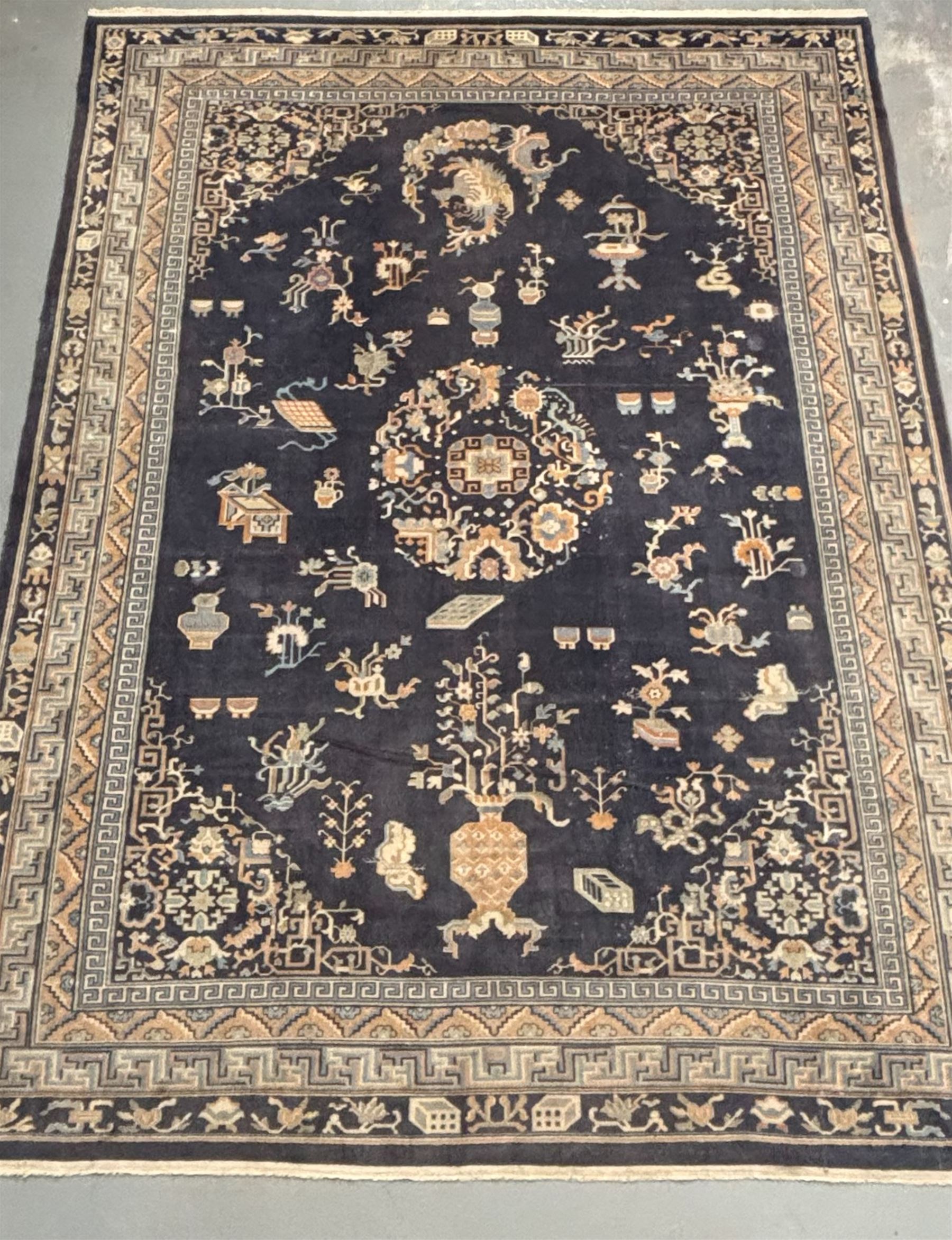Chinese hand knotted wool carpet, first half of the 20th century, the blue field decorated with  auspicious symbols and floral motifs within multiple borders. 490cm x 363cm.  - COLLECTION BY APPOINTMENT FROM: The White House, Thirsk Road, Easingwold, York, YO61 3NF - CALL 01723 507111 TO ARRANGE