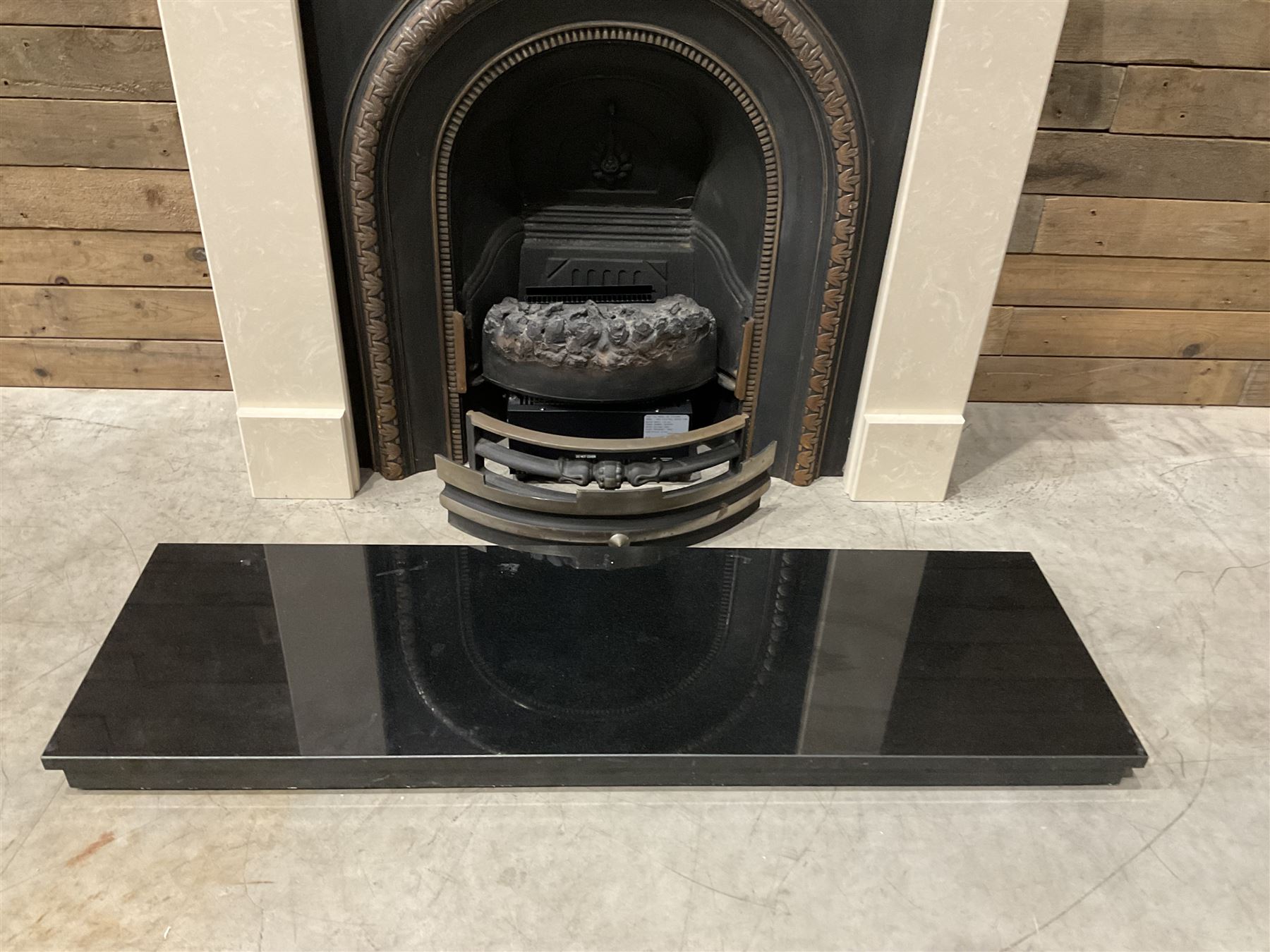 Aurora Dorchester Black Fire suite - granite style surround with cast iron insert, electric fire with remote and black hearth