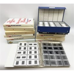 Approximately two thousand professionally mounted photographic transparencies of military interest, predominantly soldiers, groups of soldiers and uniforms, some taken of bookplates and cigarette cards etc; housed in eleven loose leaf albums and one file box, some with annotations