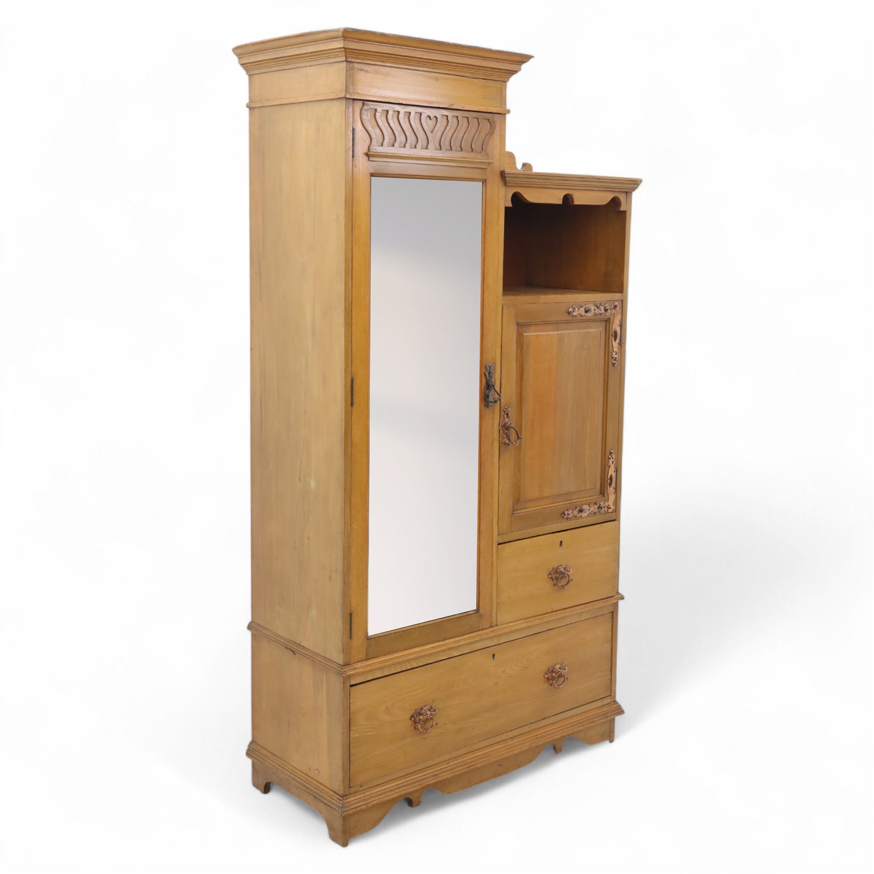 Edwardian ash combination wardrobe, moulded cornice over an open compartment and single cupboard door with carved scroll decoration, above two short and one long drawer fitted with brass handles, on shaped bracket supports