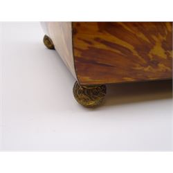 19th century tortoiseshell sewing box, of sarcophagal form upon four foliate detailed brass ball feet, the hinged cover edged in ivory with initialled silver plaque to centre, opening to reveal a silk lined interior, H9.5cm W22.5cm D18cm