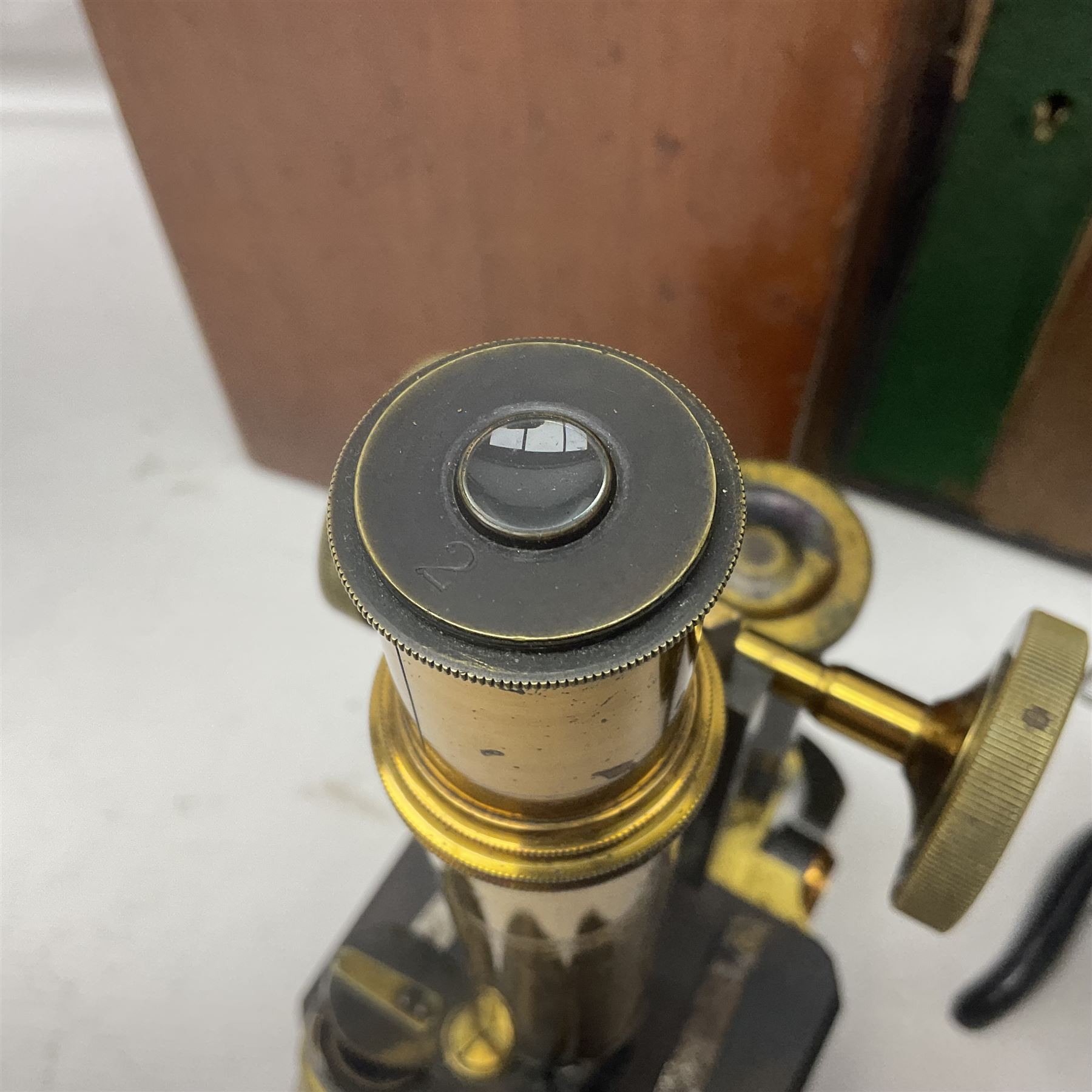 Three microscopes, comprising Swift and Son, Beck model 22 no 5512 amd E. Leitz Wetzlar no 113555, all boxed