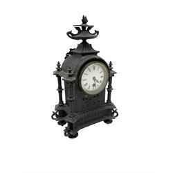 French - 19th century 8-day timepiece mantle clock in a cast iron effect case, break arch case surmounted with a flaming urn, free standing pillars to the corners and raised on four circular feet, enamel dial with Roman numerals, minute track, fleur di Lis hands, and egg and dart slip. With pendulum.